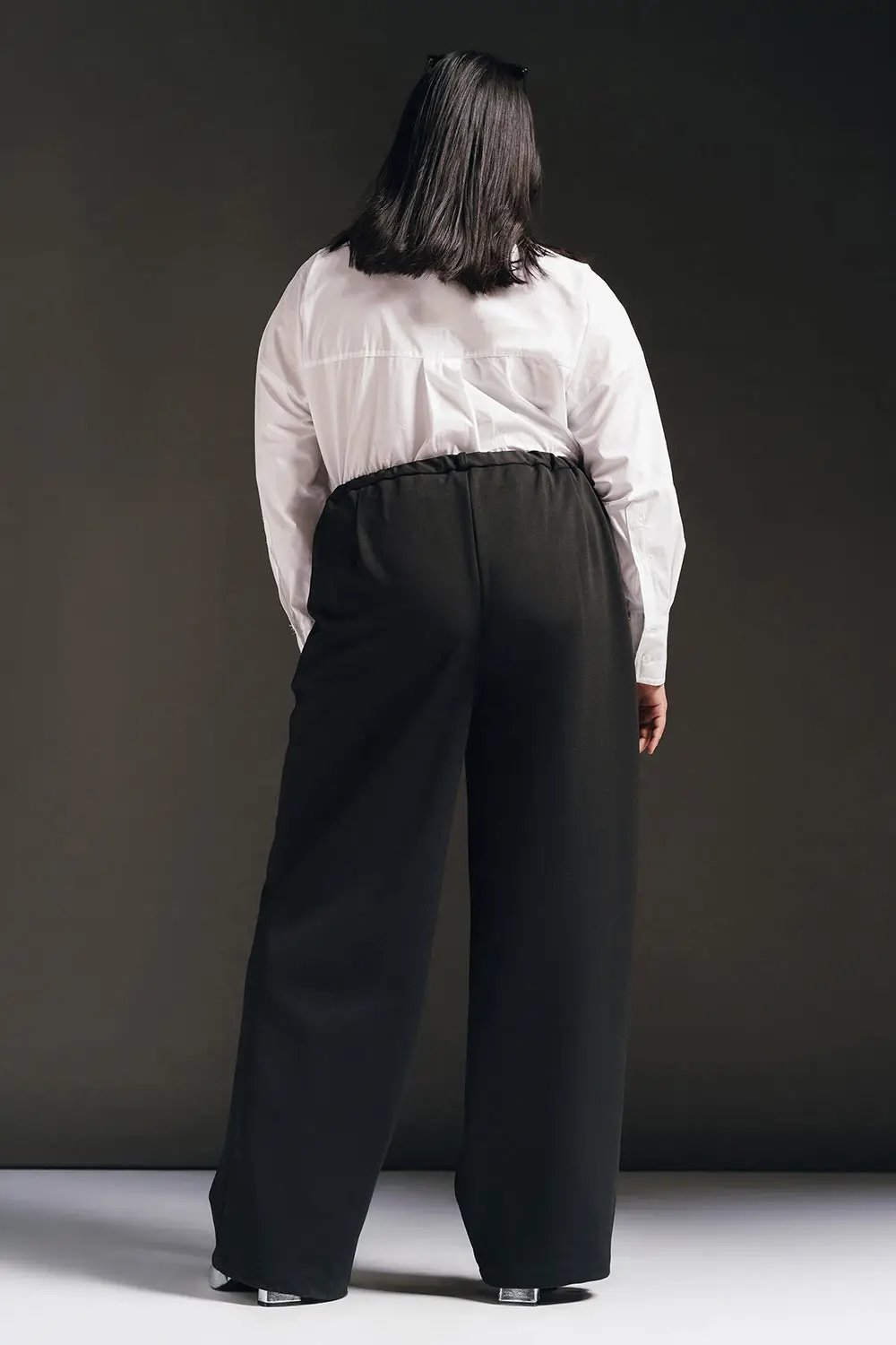 polished black curve textured korean pants